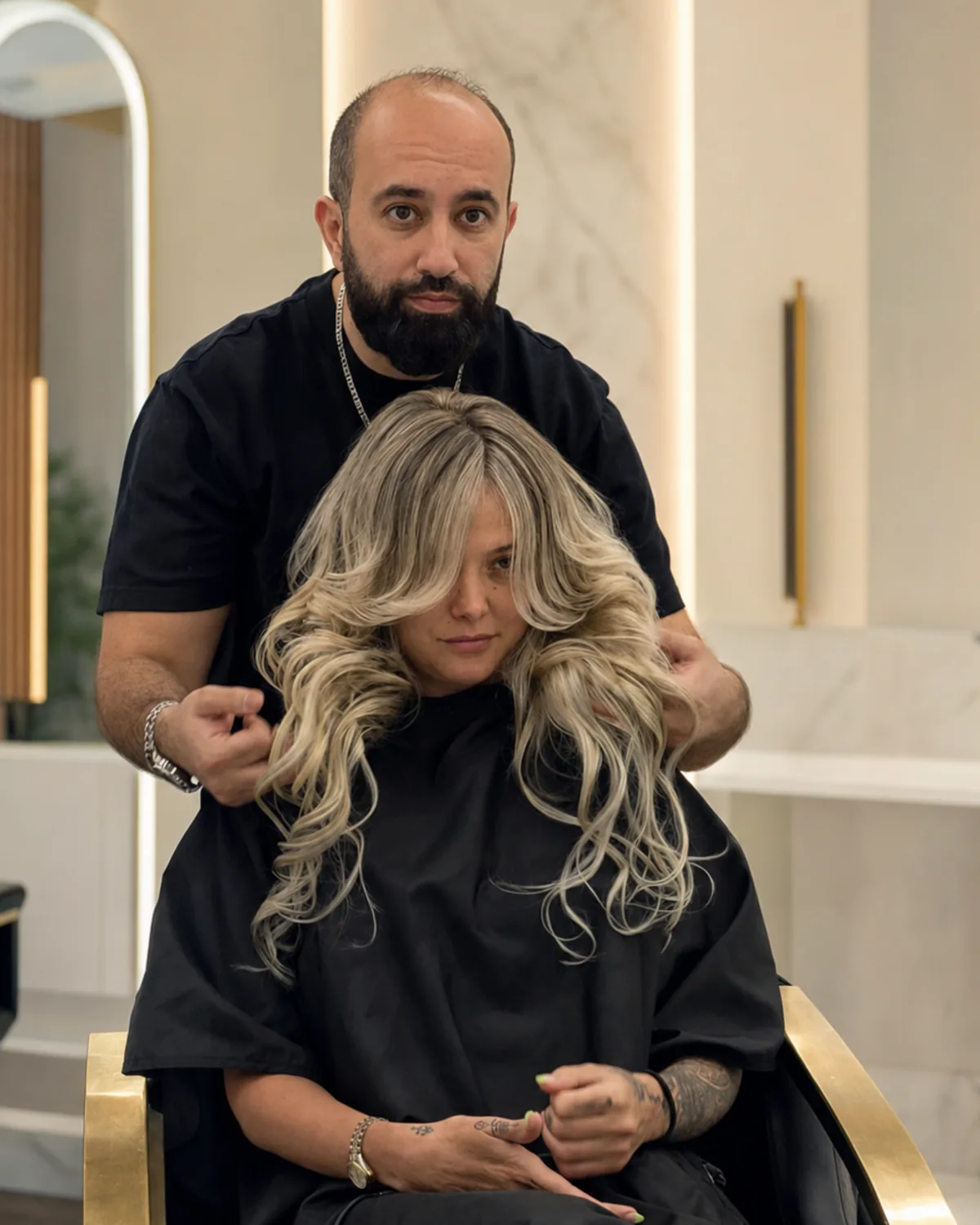 Fabio, founder, master colorist and master stylist, presenting a dimensional blonde result