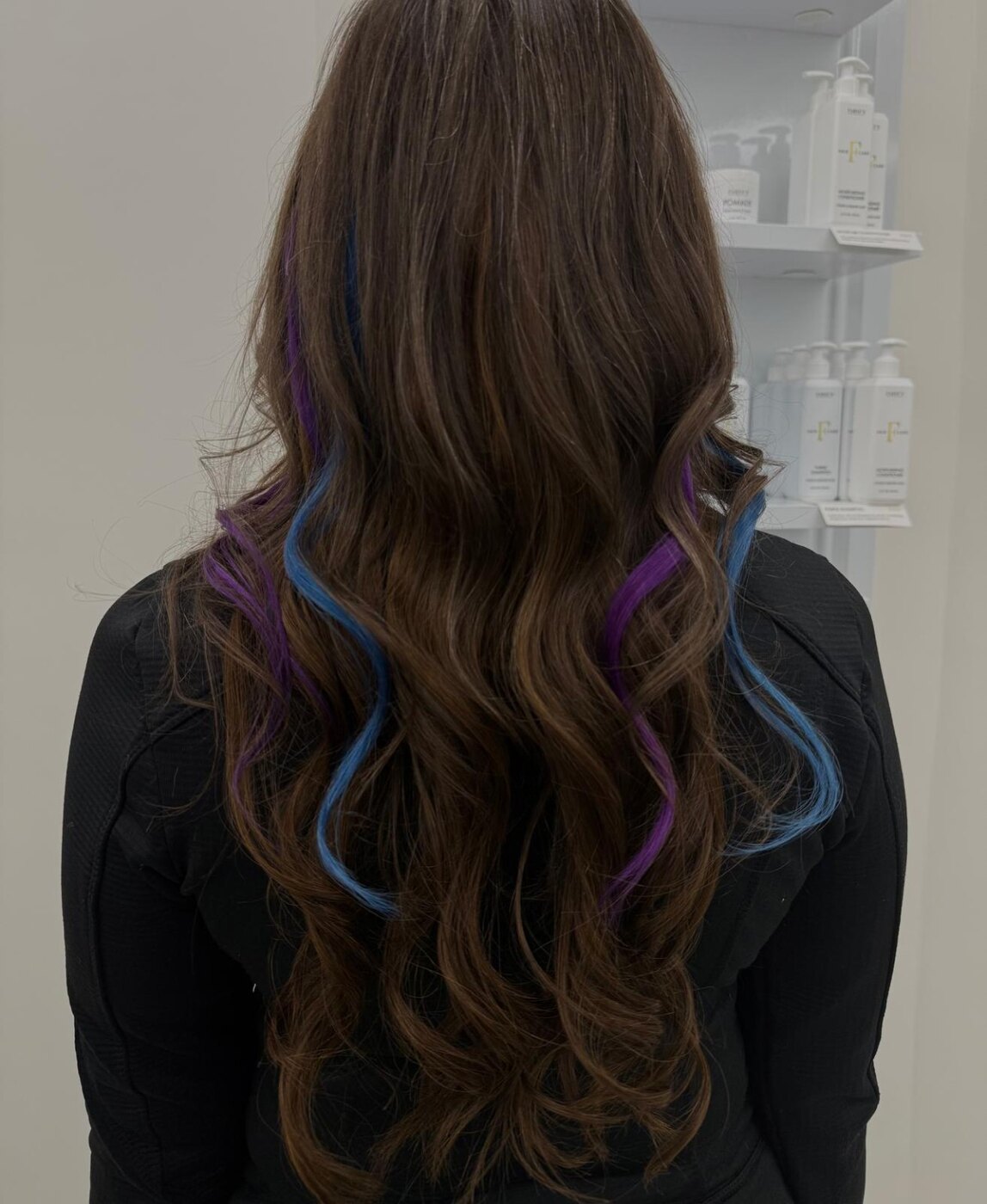 Rich brunette waves with blue and violet accents